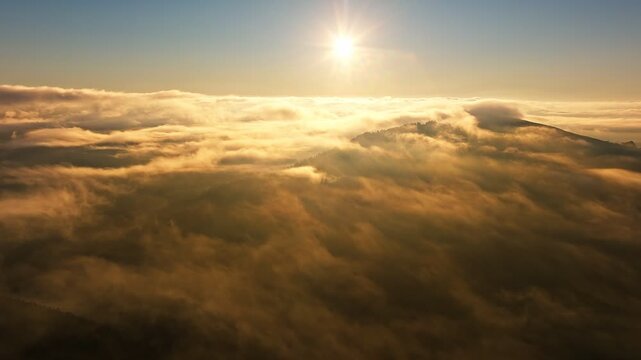 Majestic Sunrise Over Clouds Serene and Beautiful Aerial Views