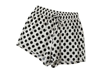 A pair of white shorts with black polka dots featuring an elasticated waistband and a drawstring tied in a bow