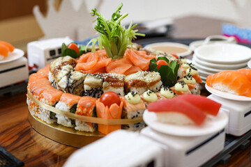 Delicious sushi platter with various rolls and nigiri on display.