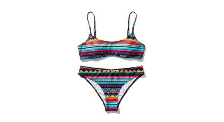 A two-piece swimsuit featuring a multicolored striped and geometric pattern The top has thin straps and the bottom is a high-cut style displayed against a white background