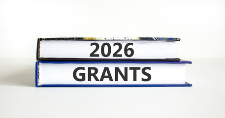 2026 Grants symbol. Concept words 2026 Grants on beautiful books. Beautiful white paper background. Business and 2026 grants concept. Copy space.