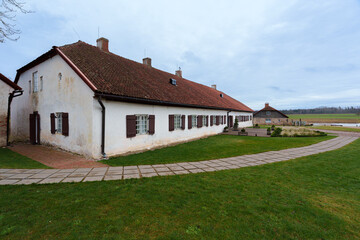 Restored Nurme Manor Buildings with Stone and Wood Architecture in Latvia
