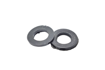 Two paronite gaskets for sealing threaded connections of pipes, taps, and mixers on a PNG background.