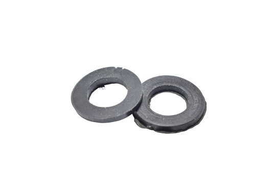 Two paronite gaskets for sealing threaded connections of pipes, taps, and mixers on a PNG background.