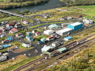 Aerial view of rural town and river in northern Hokkaido – Countryside landscape