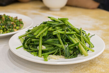 Asian stir-fried water spinach, Morning Glory Side Dish.