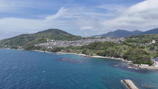 長崎県長崎市、五島灘の風景を空撮しました。遠くに軍艦島が見えます。