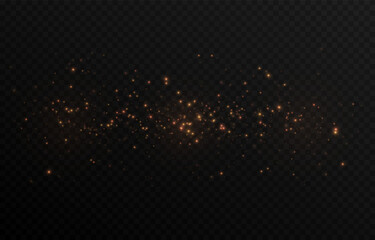 Golden glowing magic dust on a transparent background. Flying light particles PNG. Glowing dust PNG.