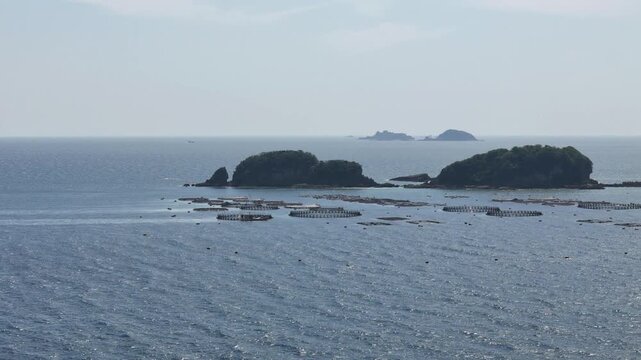 長崎県長崎市、五島灘の風景を空撮しました。遠くに軍艦島が見えます。