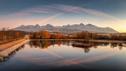 Strbsky Pond at sunset in autumn