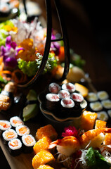 Colorful Sushi Platter with Fresh Garnishes