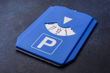 A parking disc, permit, or ticket for measuring time and paying municipal services. A parking disc