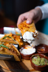 Crispy tacos with sauces