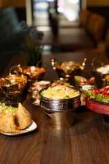 Traditional Indian Dinner Feast on Wooden Table