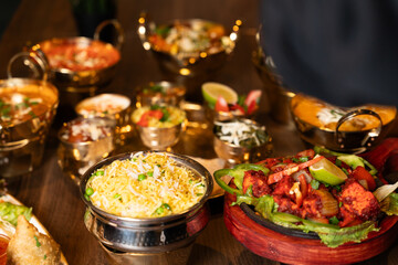 Traditional Indian Dinner Feast on Wooden Table