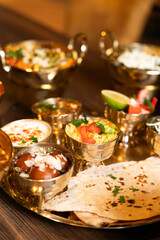 Traditional Indian Thali Meal with Chapati and Curry