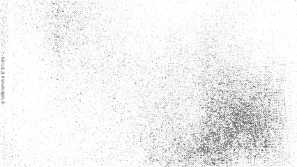 Subtle halftone vector texture overlay with monochrome abstract splattered effect. Monochrome dotted halftone texture background with abstract dust explosion effect. 