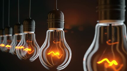 A row of hanging vintage incandescent light bulbs. Perfect for concepts of ideas, innovation, creativity, and energy. Ultra HD 4K 3840x2160 4K loopable animation