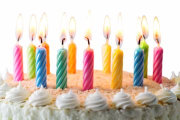 A festive birthday cake topped with colorful lit candles, isolated on transparent background