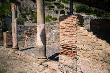 Plakat Italy, Naples, Baia, view and details of the archaeological area specialized in the spa treatments of the ancient Romans.