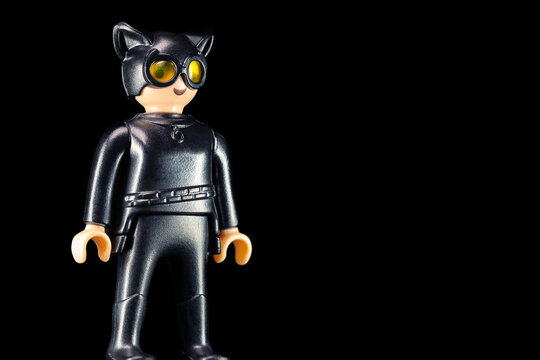 Kinder Surprise DC Catwoman Selina Kyle standing sideways on a black background