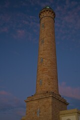 lighthouse in Chipiona in Andalusia in warm blue light after sunset