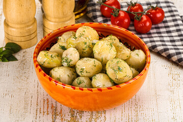 Young boiled mini potato with dill