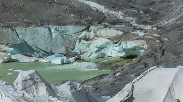 Time lapse, ice in a glacier lake. Melting glacier in the Swiss Alps. Rhone Glacier, the source of the river Rhone. Furka Pass, Canton Valais, Switzerland