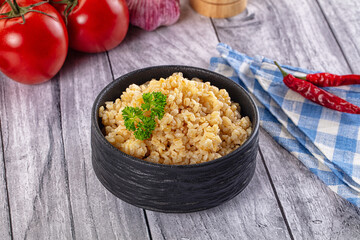 Vegan cuisine - boiled bulgur garnish