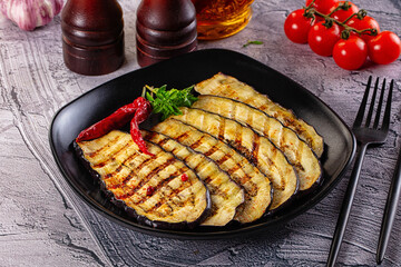Hot grilled eggplant slices snack