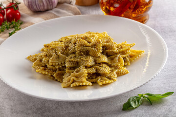 Italian green pasta farfalle with pesto