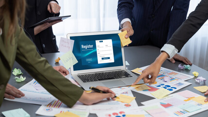 Analyst team use sticky note for creative and analytic brainstorm for business idea with BI data dashboard on laptop screen. Analysis financial data visualization tech for marketing strategy. Prodigy