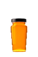 Jar of organic honey on white background