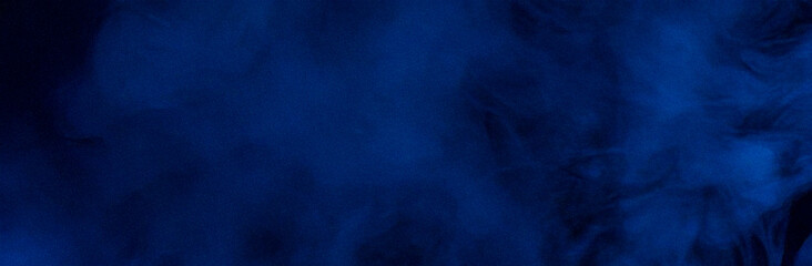 Dark blue smoke and fog texture, dramatic and eerie, creating a mysterious atmosphere. Ideal for Halloween backgrounds, cinematic scenes, graphic overlays, and dark-themed digital designs.