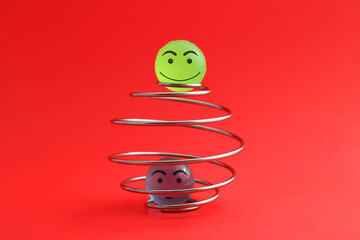 Happy sphere breaks free from spiral while another remains trapped