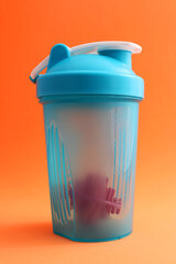 Reusable plastic cup for water or juice with stirrer inside