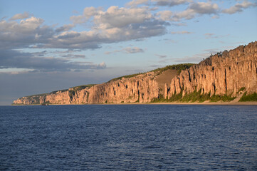 The Lena Pillars are a natural rock formation along the banks of the Lena River in far eastern Siberia on sunset, Sakha Republic, Russia