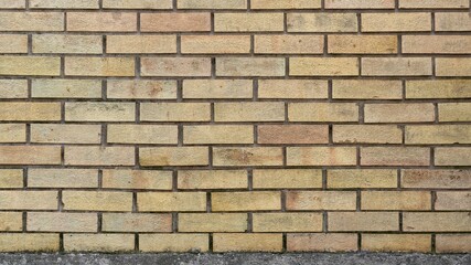 Fototapeta premium Beige brick wall background