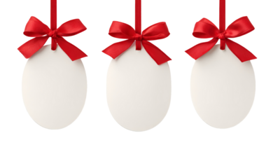 Three blank white oval tags with red bows isolated on a transparent background