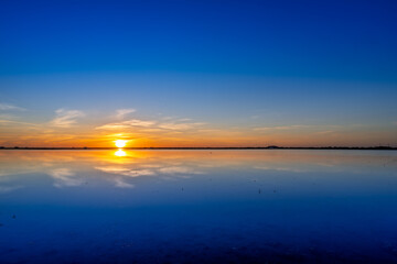 Stunning sunset view over Isla Mayor rice fields in Seville