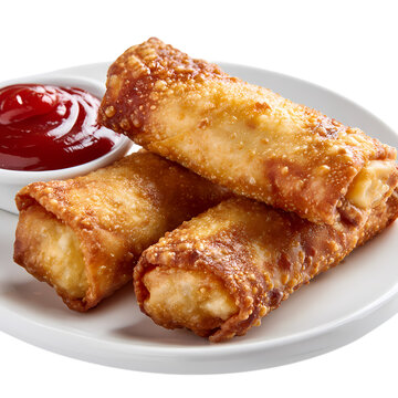 Three golden-brown egg rolls on white plate with ketchup isolated on transparent background