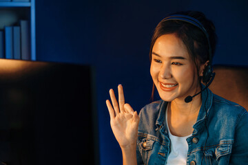 Host channel Asian influencer talking in broadcast streaming online wearing headsets on social...