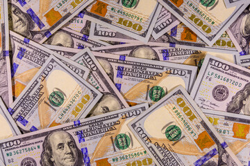 Background of one hundred dollar banknotes