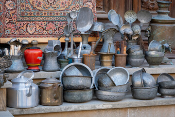 Vintage Metal Utensils Displayed on Steps