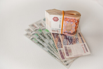 Stack of Russian Rubles on a Light Surface With Different Denominations Displayed Clearly