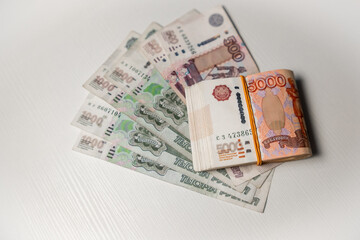 Russian Banknotes Arranged on a Table Showcasing Various Denominations Including 5000 Rubles