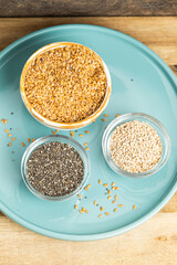 Small Bowls with Flax, Chia, and Sesame Seeds