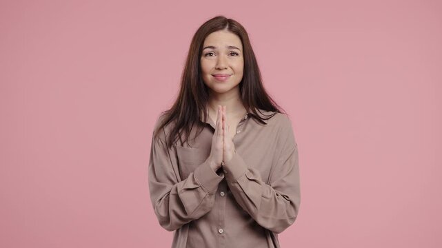 Young Pretty Woman Praying With Palms In Sincere Silent Request. Hope, Faith 
