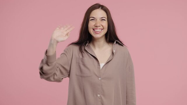 Friendly Woman waving hand - hello, salute, chao, adios. Parting, say bye camera