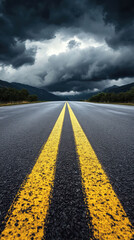 Dynamic road stretching into stormy landscape with dark clouds overhead